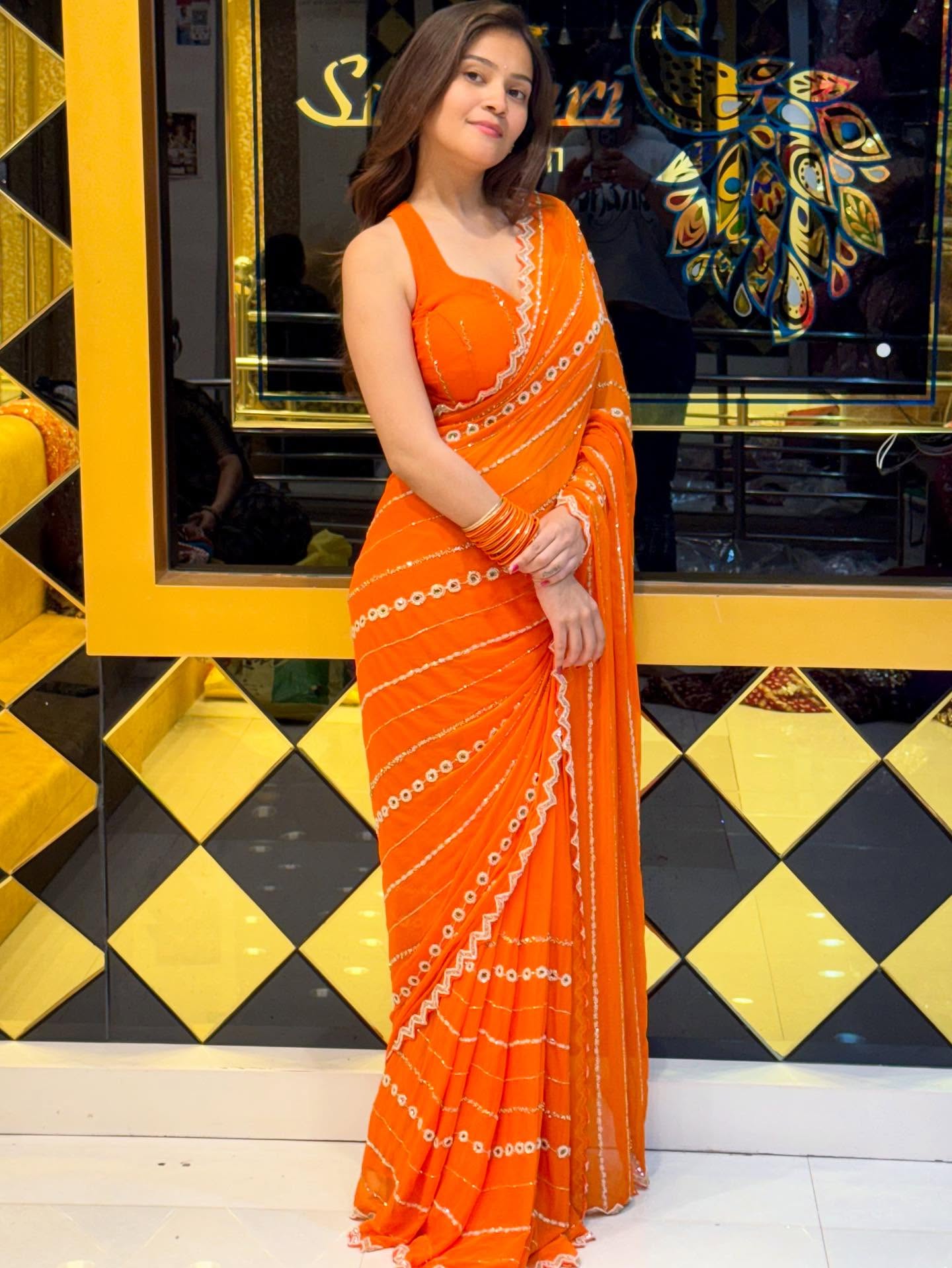 Celebrity Orange Saree