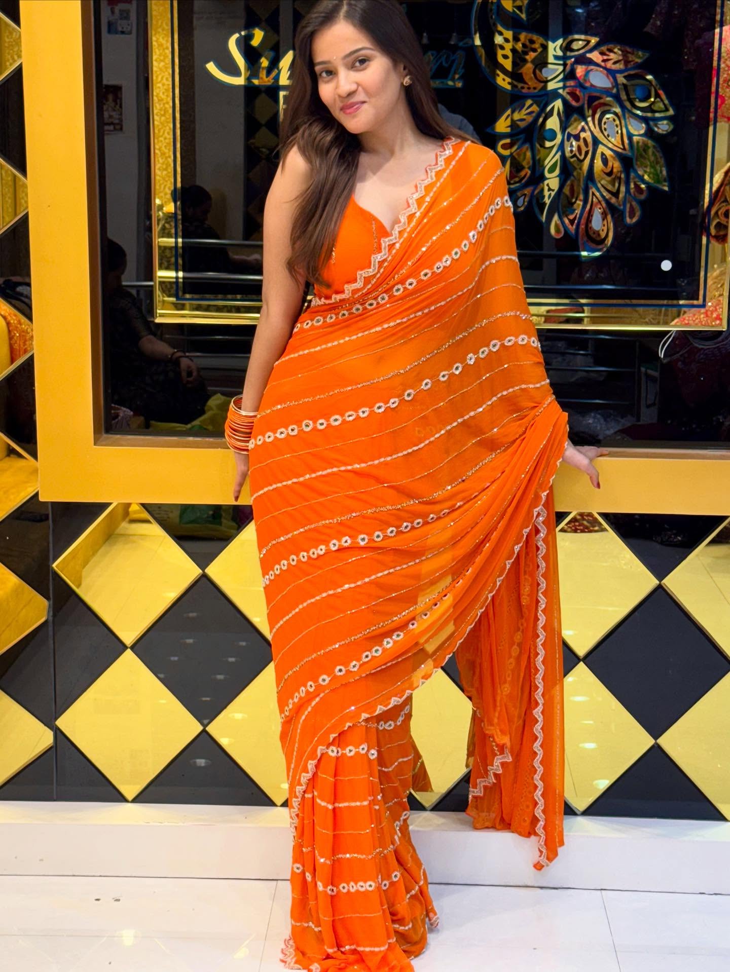 Celebrity Orange Saree