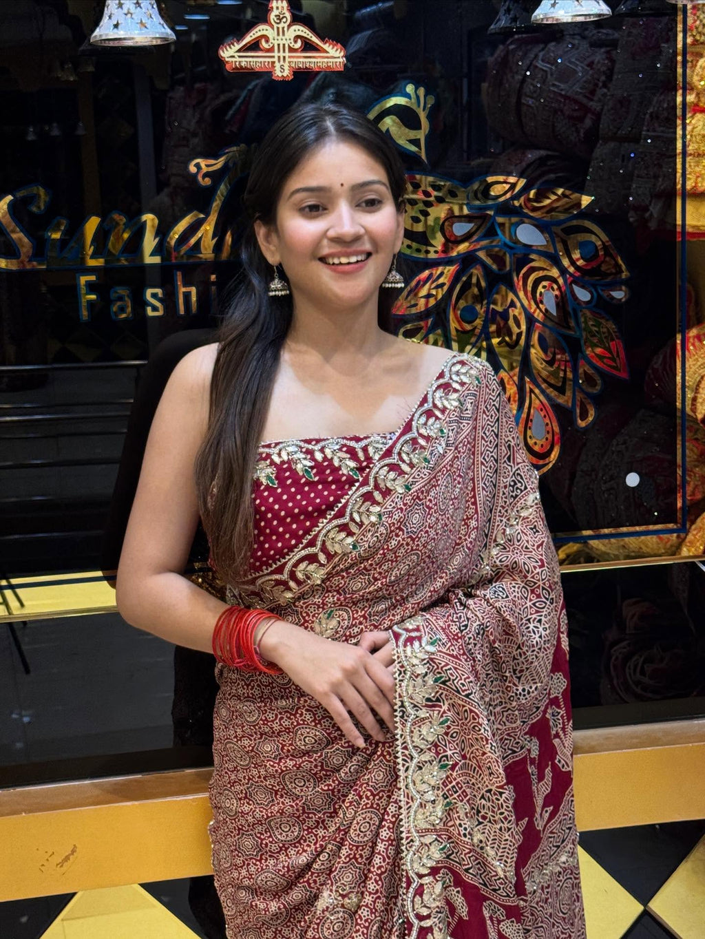 Red Gaji Silk Ajarak. with Gotapati Handwork saree