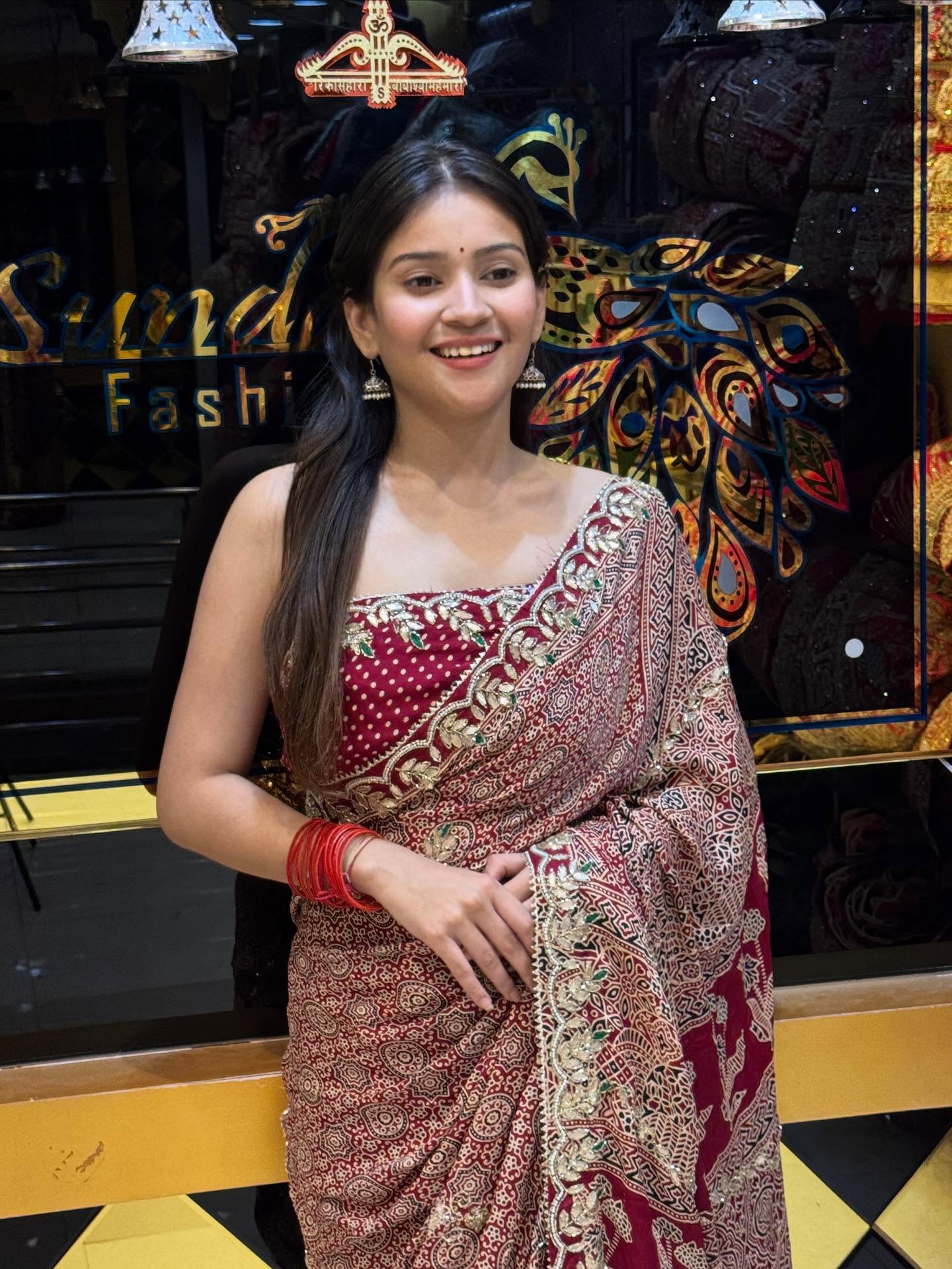 Red Gaji Silk Ajarak. with Gotapati Handwork saree