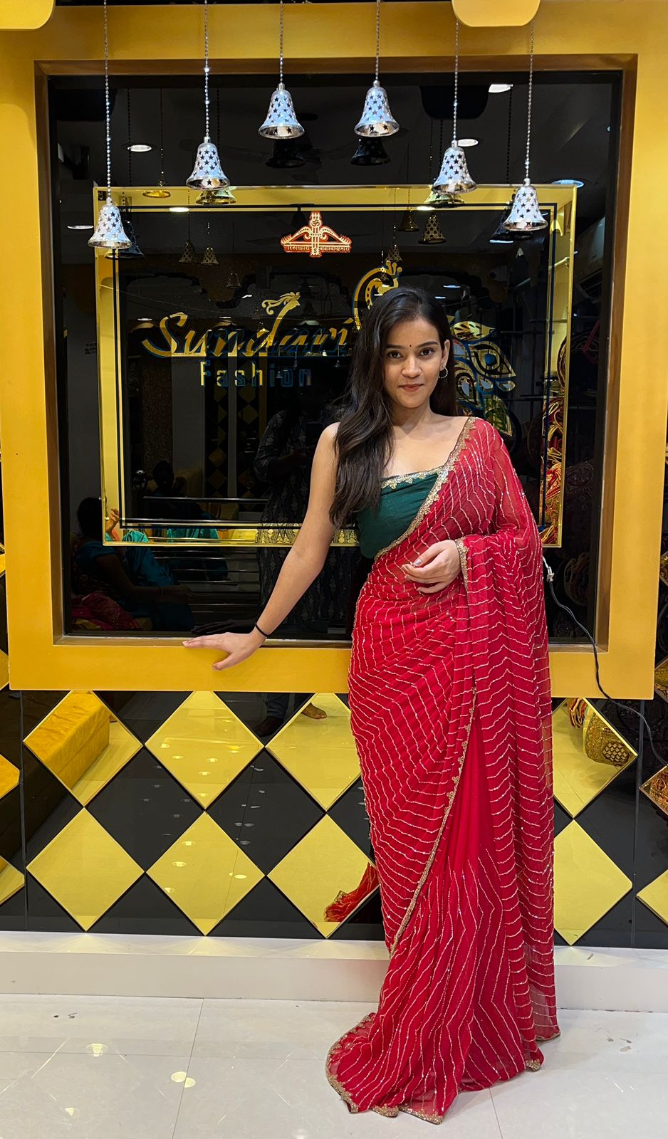 Red Saree With Golden Work And Green Blouse
